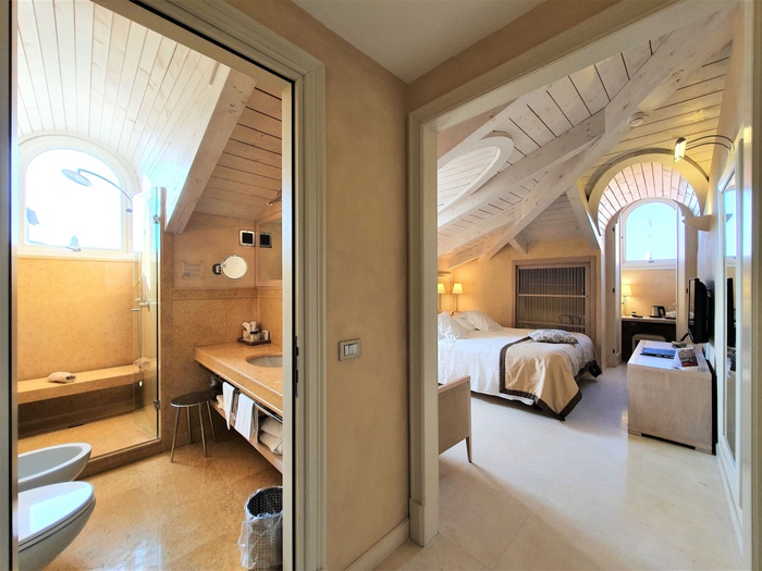 Habitación deluxe penthouse art hotel novecento bolonia Habitación deluxe penthouse art hotel novecento bolonia