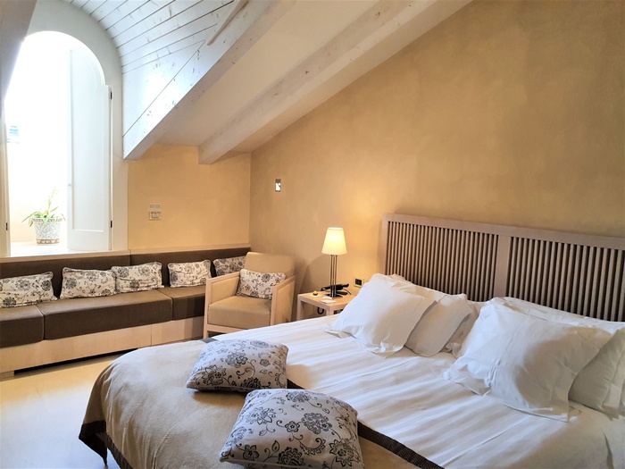 Habitación deluxe penthouse art hotel novecento bolonia Habitación deluxe penthouse art hotel novecento bolonia