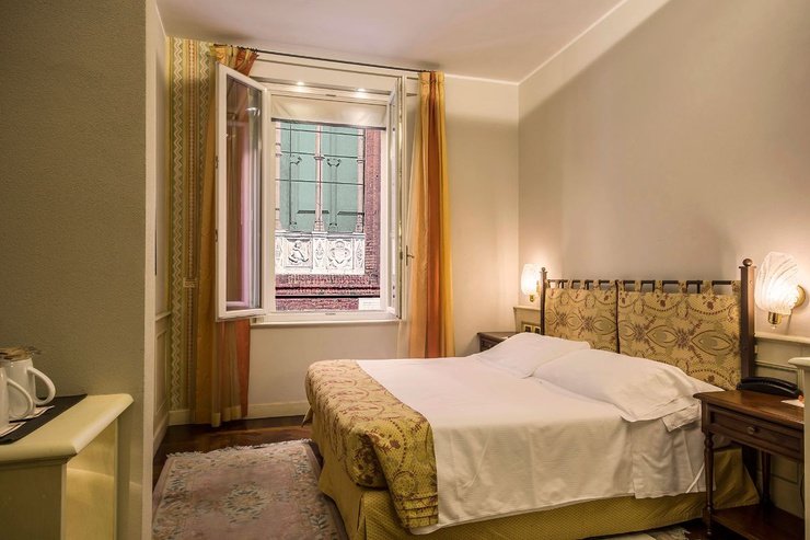 Habitación doble clásica art hotel commercianti bolonia Habitación doble clásica art hotel commercianti bolonia
